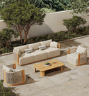 JANSSONG outdoor sofa with two rope-detail armchairs and a warm-toned coffee table 